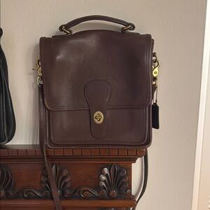 Coach Brown Crossbody Bag with Adjustable Strap and Gold Accents